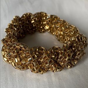 Gold tone braided bracelet - excellent condition